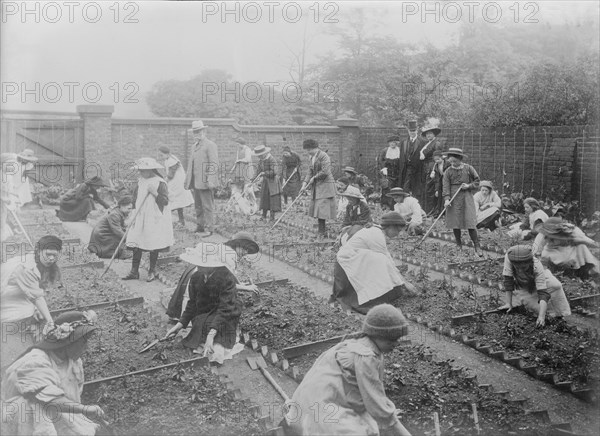 Lady Henry showing T.P. O'Connor over Children's Garden, 1913. Creator: Bain News Service.