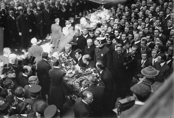 Tim Sullivan's coffin brought out, 1913. Creator: Bain News Service.