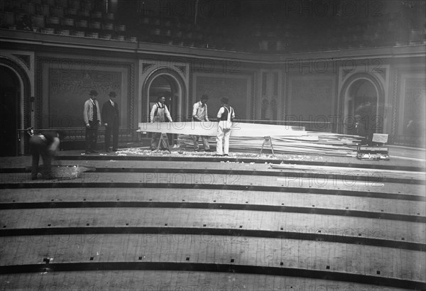 Tearing up floor of House of Reps., between c1910 and c1915. Creator: Bain News Service.