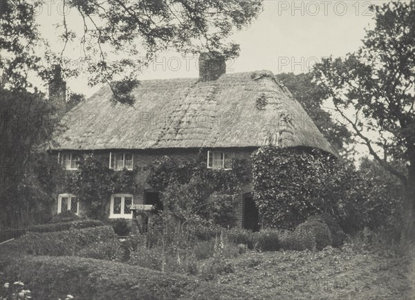 Thatched cottage. From the album: Photograph album - England, 1920s. Creator: Harry Moult.