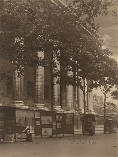 City street with columns of a building and hoardings, 1918-1920s. Creator: Eunice Harriett Garlick.