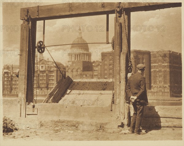 [Man on riverbank]. From the album: Photograph album - London, 1920s. Creator: Harry Moult.