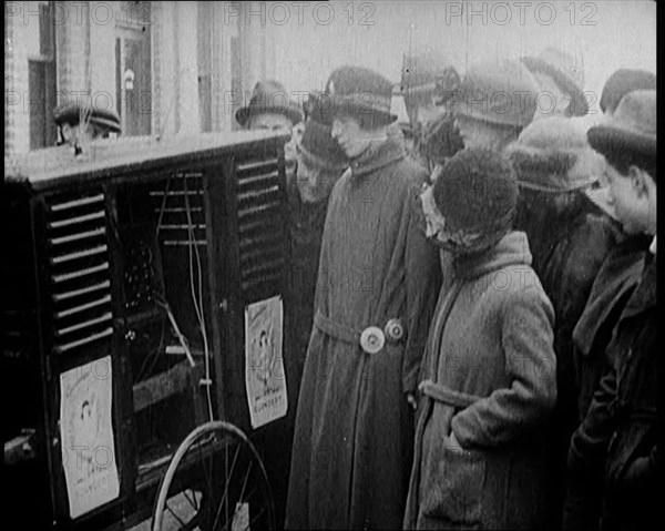 People Gathering Around a Large Outdoor Wireless, 1922. Creator: British Pathe Ltd.