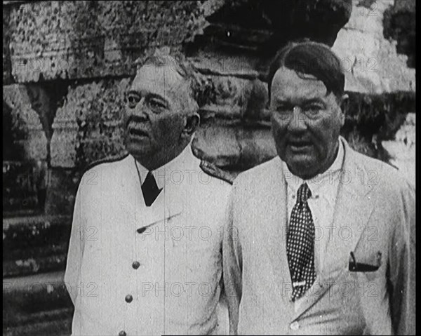 Publisher Alfred Harmsworth, 1st Viscount Northcliffe, Talking to Another Man by a Ruin, 1922. Creator: British Pathe Ltd.