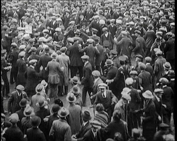 Disruptions and Fighting Breaking Out in the Crowd During a Speech by the Irish Chairman..., 1922. Creator: British Pathe Ltd.