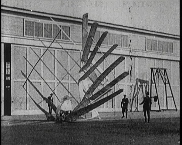 An Early Seven Winged Plane Collapsing in on Itself During Take Off, 1922. Creator: British Pathe Ltd.