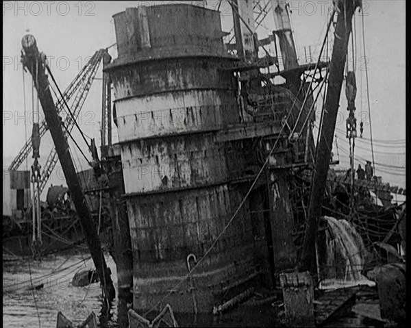 German Battleships Being Salvaged in Scapa Flow, 1926. Creator: British Pathe Ltd.