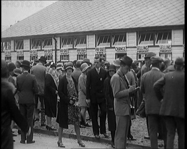 A Crowd of People Standing Outside a Totaliser/Tote Office at a Horse Race Course..., 1929. Creator: British Pathe Ltd.