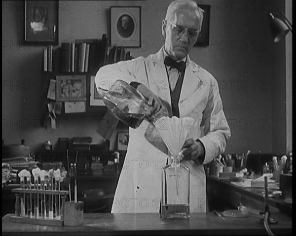 Dr Alexander Fleming, the Inventor of Penicillin, Experimenting in a Laboratory, 1929. Creator: British Pathe Ltd.