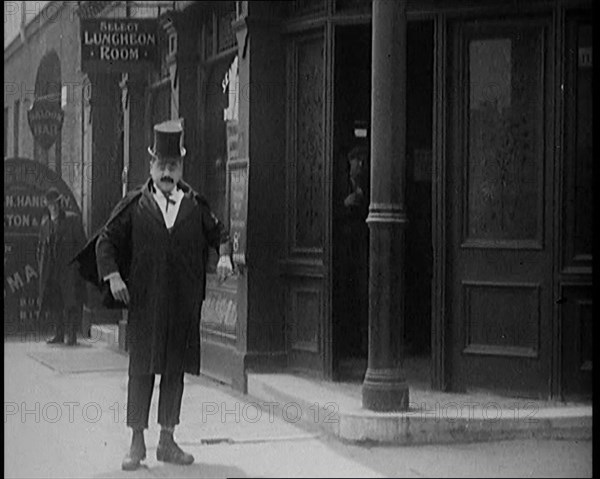 Scenes of Comedian Billy Bennett Being Thrown Out of a Public House, 1929. Creator: British Pathe Ltd.