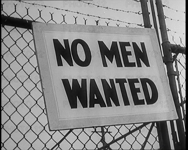 A Sign Hanging on a Fence. Sign Read: 'No Men Wanted', 1929. Creator: British Pathe Ltd.