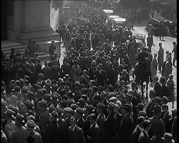 Unemployed People Gathering on the Streets , 1929. Creator: British Pathe Ltd.