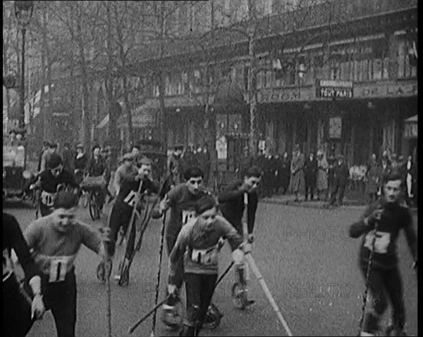 Racers Skiing Through Paris, France on Wheeled Skis, 1929. Creator: British Pathe Ltd.