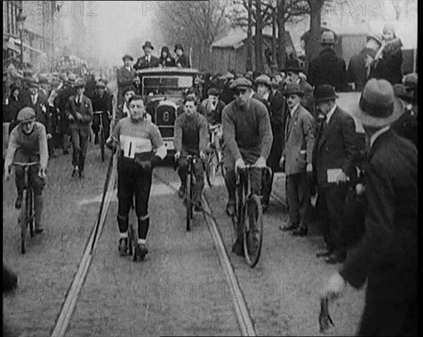 Racers Skiing Through Paris, France on Wheeled Skis, 1929. Creator: British Pathe Ltd.