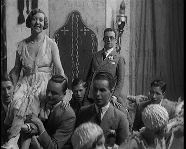 Scene from a Stage Show: Male and Female Civilians Dancing on a Stage in a Routine with..., 1929. Creator: British Pathe Ltd.