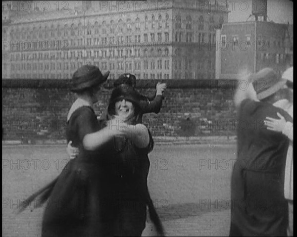 A Group of Plus Size Female Civilians Dancing on a Beach, 1920. Creator: British Pathe Ltd.