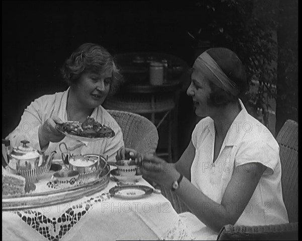 Betty May Nuthall Shoemaker, the British  World Top Female Tennis Player, Drinking Tea..., 1920. Creator: British Pathe Ltd.