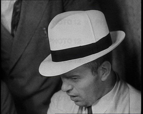 A Group of Male American Civilians Dressed in a Gangster Fashion, 1930. Creator: British Pathe Ltd.