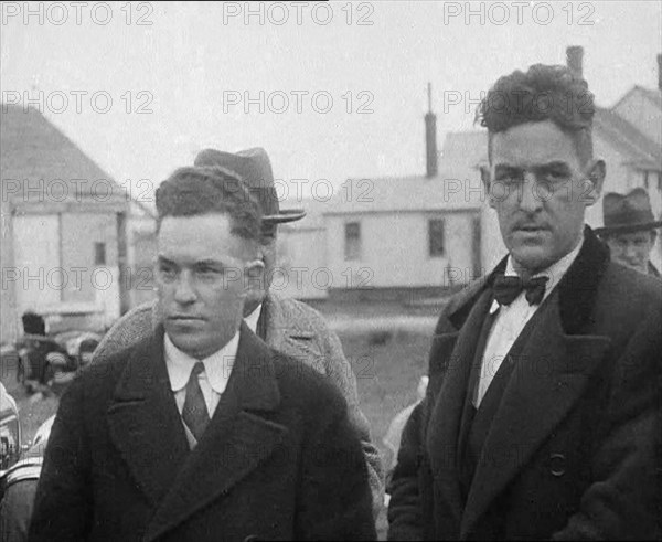 Male American Civilians Being Arrested by the Police, 1930. Creator: British Pathe Ltd.