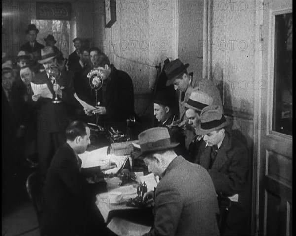 A Group of Male American Civilians in a Press Room, 1930s. Creator: British Pathe Ltd.