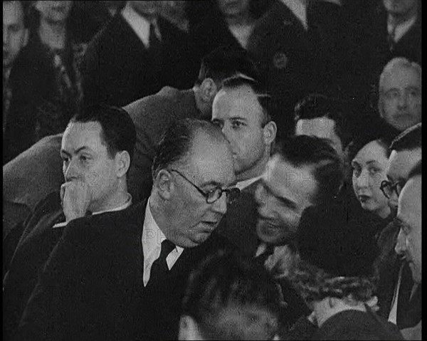 Bruno Richard Hauptmann Speaking To Attorney Edward J. Reilly During His Trial in the Lind..., 1930s Creator: British Pathe Ltd.