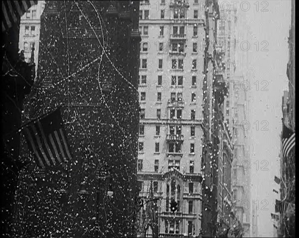 Building with American Flags in the Foreground, 1933. Creator: British Pathe Ltd.