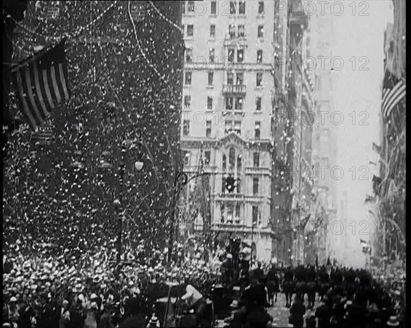 Large Crowd Gathering with American Flag in the Foreground, 1933. Creator: British Pathe Ltd.