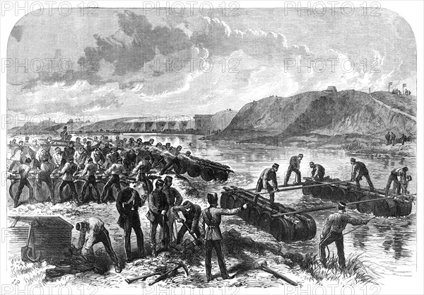 The Volunteer Review at Portsmouth: the 1st Hants Engineer Volunteers constructing a...bridge, 1868. Creator: Unknown.