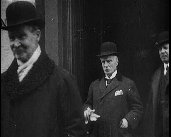 British Member of Parliament Andrew Bonar Law Exiting a Building, 1922. Creator: British Pathe Ltd.