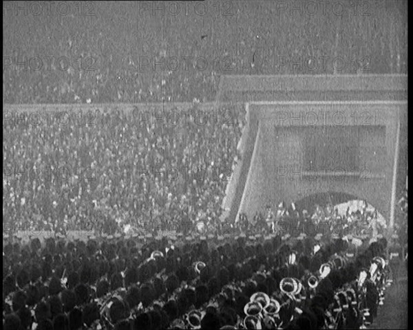 Crowds Cheer as King George V and Queen Mary of The United Kingdom Enter of the Wembley..., 1924. Creator: British Pathe Ltd.