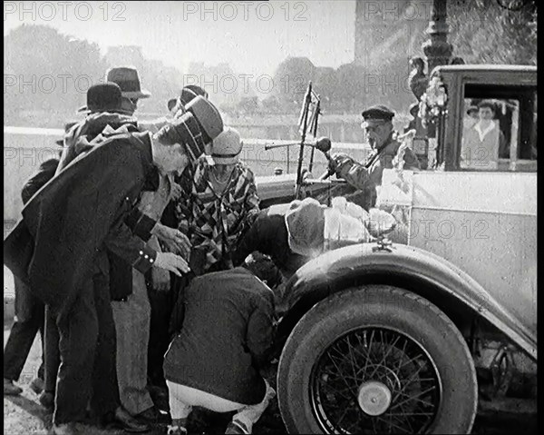 Scene from the Film 'The Compulsory Husband': The Actor Monty Banks  Causes an Accident..., 1920s. Creator: British Pathe Ltd.