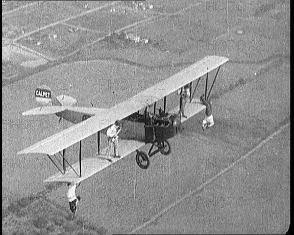 Jazz Musicians Playing from the Wing of a Biplane in the Air, 1921. Creator: British Pathe Ltd.