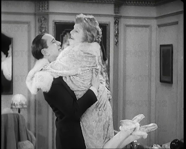 Scene from the Film 'Champagne': The Actress Betty Balfour Embracing the Male Actor Jean..., 1920s. Creator: British Pathe Ltd.