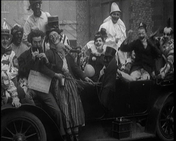 British Students in Fancy Dress Costumes Playing About at a Rag Event, 1920. Creator: British Pathe Ltd.