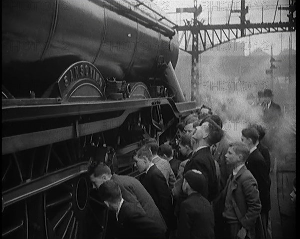 Boys Staring at a Steam Locomotive, 1931. Creator: British Pathe Ltd.