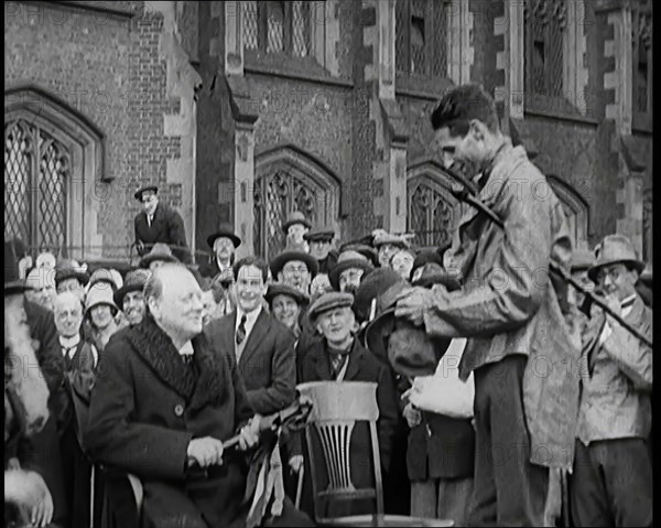 Winston Churchill, Chancellor of the Exchequer, Being Presented With an Irish Cap in Front..., 1926. Creator: British Pathe Ltd.