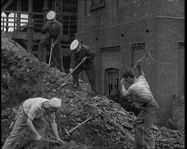 Sailors Digging Coal Outside, 1921. Creator: British Pathe Ltd.