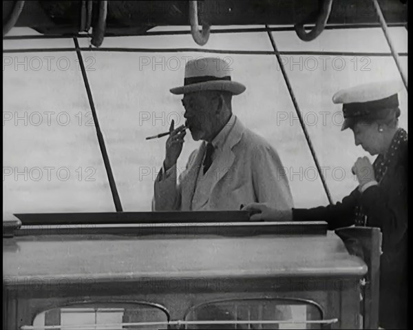 King George V on the Deck of the Royal Yacht Accompanied by Male and Female Civilians, 1926. Creator: British Pathe Ltd.