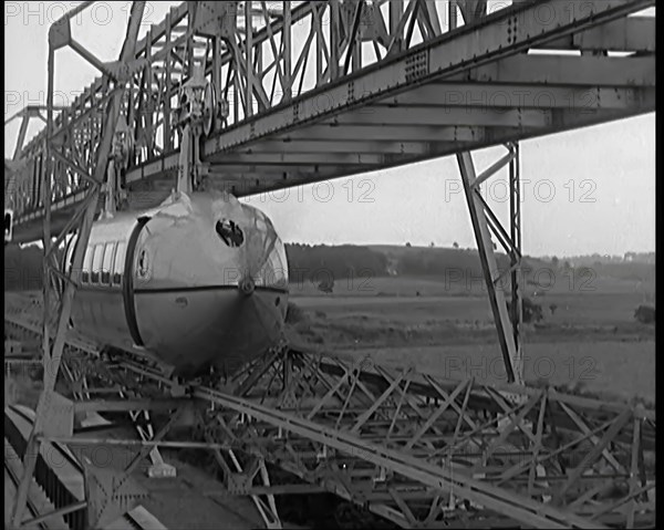 The George Bennie Railplane Driven by a Propeller at Each End Moving Along a Suspended Mono..., 1931 Creator: British Pathe Ltd.