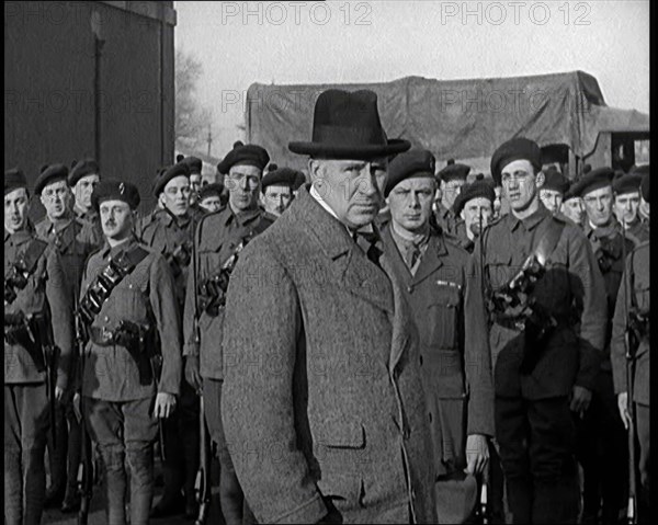 A British Man Inspecting and Speaking to Lines of Irish Auxiliary Soldiers, 1921. Creator: British Pathe Ltd.