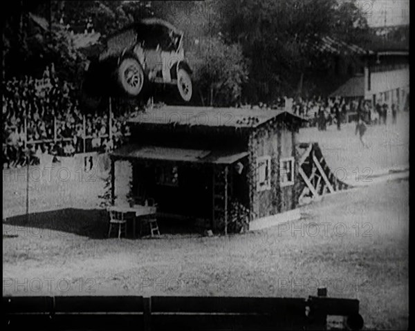 A Motorcar Jumping Over a Wooden Shack, 1920. Creator: British Pathe Ltd.