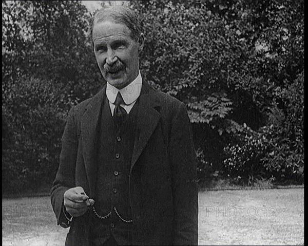 Lord Privy seal Andrew Bonar Law Standing in a Garden, 1921. Creator: British Pathe Ltd.