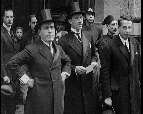 Italian Prime Minister Benito Mussolini Standing With Other Italian Politicians, 1922. Creator: British Pathe Ltd.