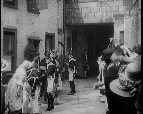 Scene from the Feature Film 'Nelson': Crowds of Actors in Period Costume Being..., 1920s. Creator: British Pathe Ltd.