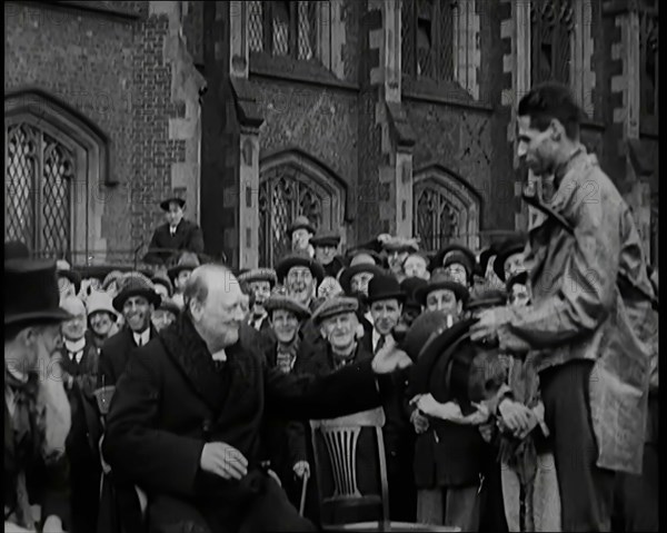 Winston Churchill, Chancellor of the Exchequer, Being Presented With an Irish Cap in Front..., 1926. Creator: British Pathe Ltd.