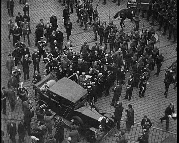 Alexander I, His Majesty the King of Yugoslavia Entering a Car, Surrounded by a Crowd, 1934. Creator: British Pathe Ltd.