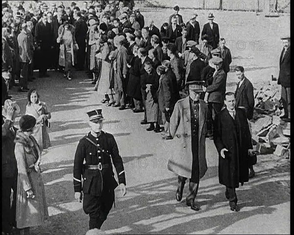 Albert I, King of the Belgians and Elizabeth, Her Majesty the Queen of the Belgians Walking...1930s. Creator: British Pathe Ltd.