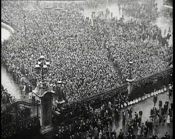 Crowds Watching the Coronation Procession of George VI, His Majesty the King, 1937. Creator: British Pathe Ltd.