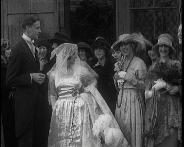 Family Gathering for Photographs at the Wedding of Beatrice Lillie and Sir Robert Peel..., 1920. Creator: British Pathe Ltd.