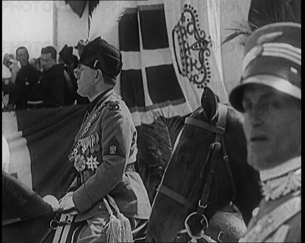 Benito Mussolini in Ceremonial Uniform on Horseback Reviewing Troops, 1926. Creator: British Pathe Ltd.